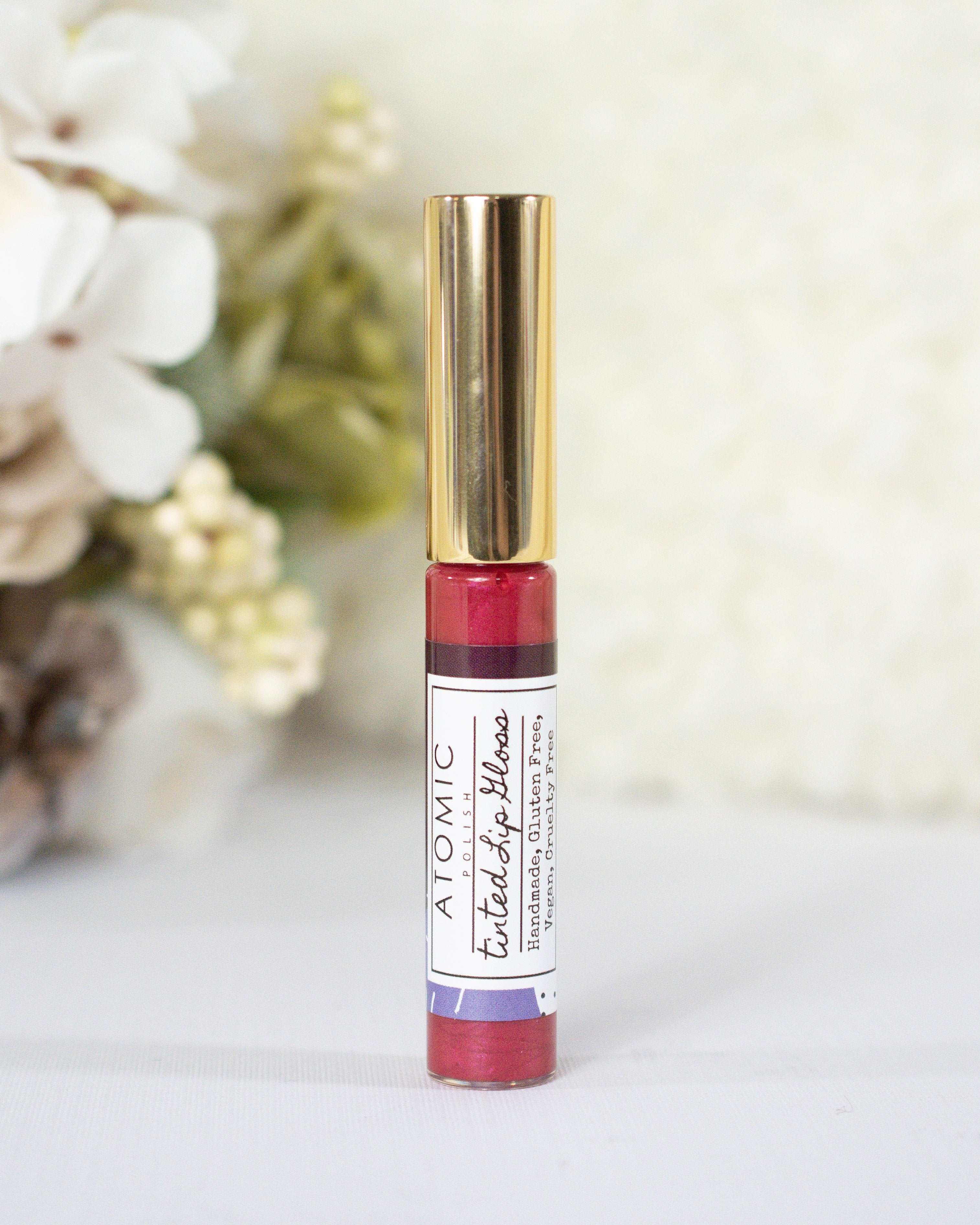 Blowing Raspberries - Tinted Lip Gloss – Atomic Polish